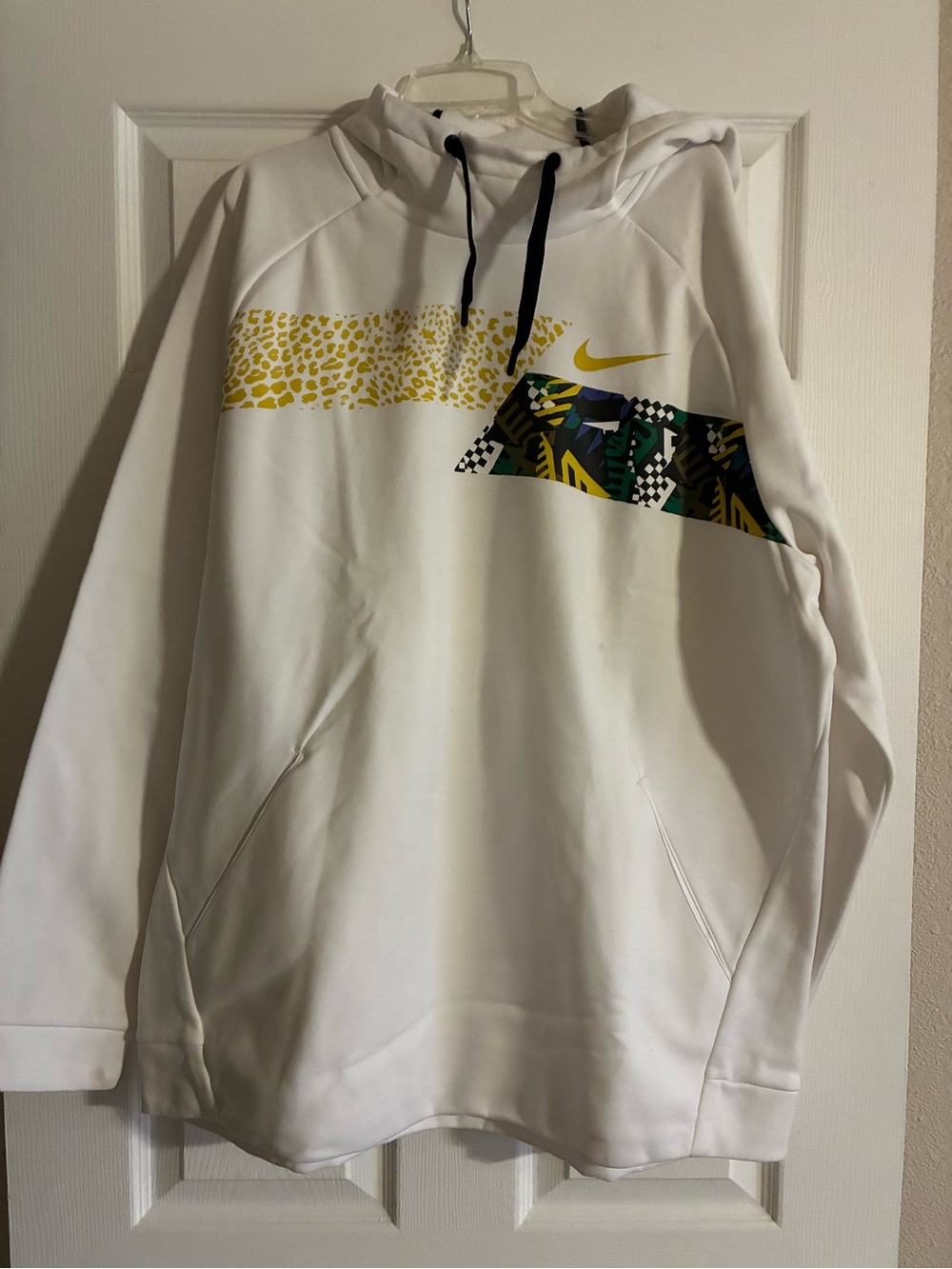 Nike White Hoodie with Yellow Swoosh and Green Graphic Panel
